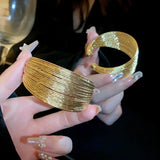 Metal alloy bracelet in gold silver color