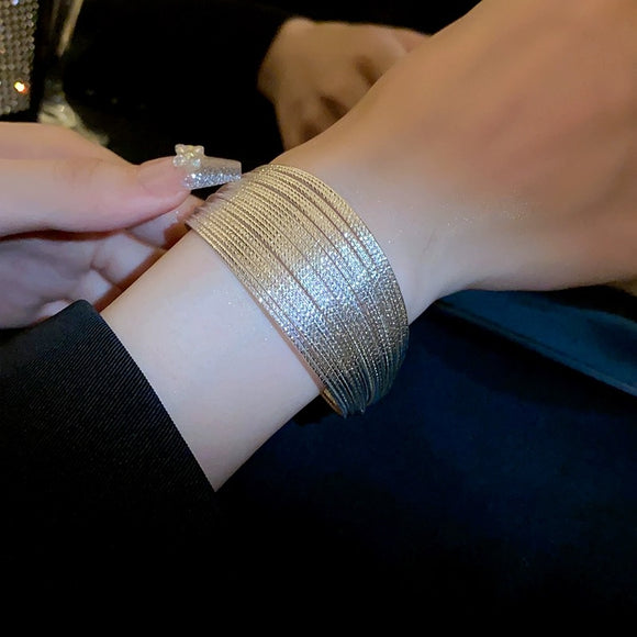 Metal alloy bracelet in gold silver color