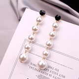 Faux ivory pearls drop tassels long earrings