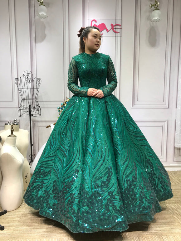 Sparkling emerald green crystals beaded ball gown long sleeves lace we Anna's Couture Dresses Sparkling emerald green crystals beaded ball gown long sleeves lace we Anna's Couture Dresses