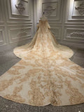 Unique off shoulder with puffy sleeves lace appliqués heavy beaded gold luxurious Long wedding gown